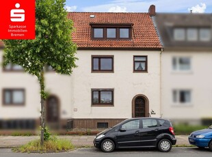 Bremen-Neustadt: Sanierungsbedürftiges Mehrfamilienhaus mit 3 Wohnungen und Garten